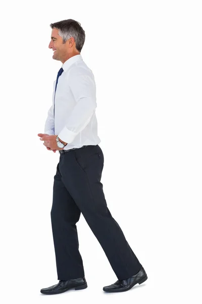 Portrait of a happy businessman walking — Stock Photo, Image