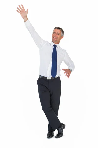 Retrato de un hombre de negocios sonriente saludando — Foto de Stock