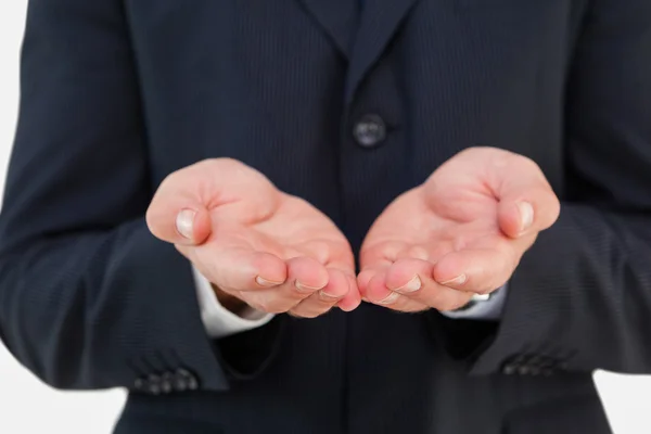 Secção média de um homem de negócios com as mãos para fora — Fotografia de Stock