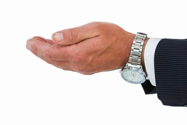 Affärsman med armbandsur och händerna ut — Stockfoto