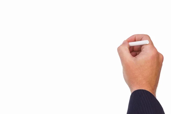 Mano de un hombre de negocios escribiendo con tiza — Foto de Stock