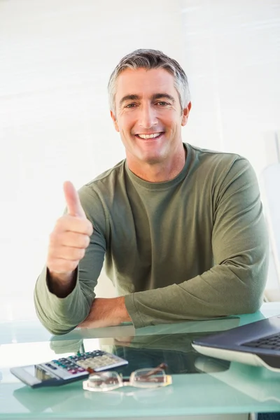 Positive casual man with his thumb up — Stock Photo, Image