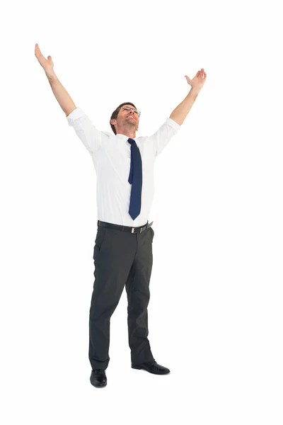 Hombre de negocios guapo animando con los brazos en alto — Foto de Stock