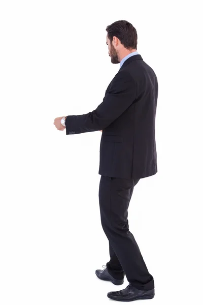 Handsome businessman in suit standing — Stock Photo, Image