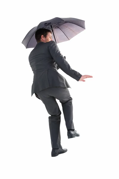 傘を保持しているスーツの女性実業家 — ストック写真
