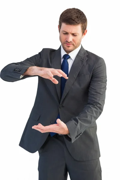 Businessman showing something with his hands — Stock Photo, Image