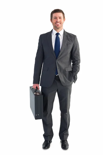 Businessman standing with his briefcase — Stock Photo, Image