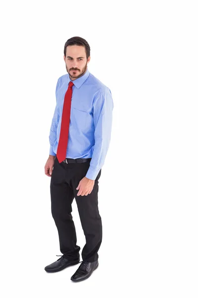 Hombre de negocios serio en traje de pie — Foto de Stock