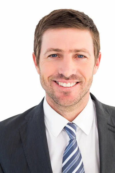 Businessman smiling at the camera — Stock Photo, Image