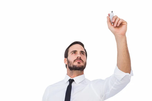 Focused businessman writing with marker — Stock Photo, Image