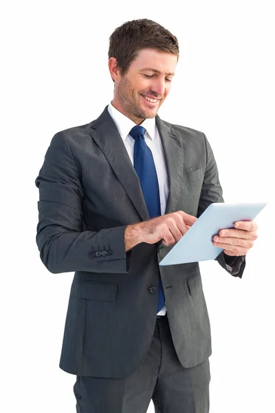 Businessman using his tablet pc — Stock Photo, Image