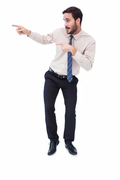 Sonriente hombre de negocios guapo señalando con el dedo — Foto de Stock