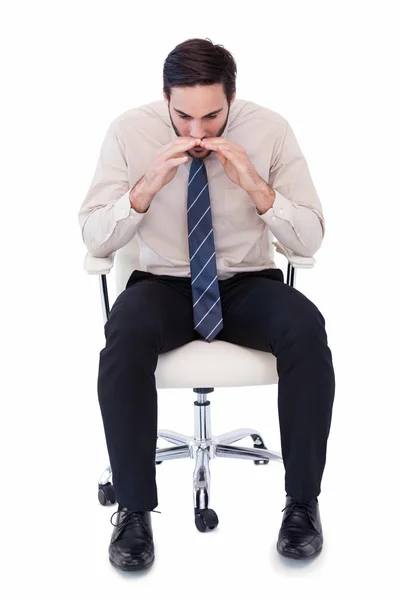 Businessman sitting on swivel chair shouting — Stock Photo, Image