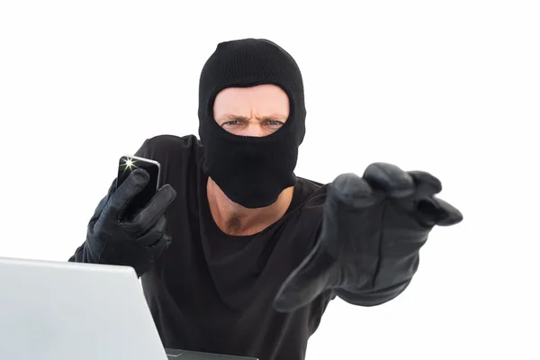Hacker reaching out to camera — Stock Photo, Image