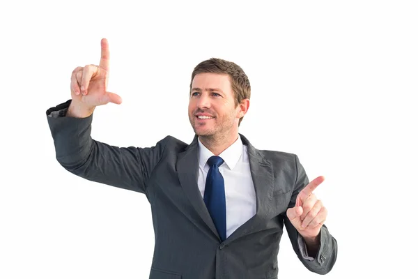 Happy businessman pointing with fingers — Stock Photo, Image