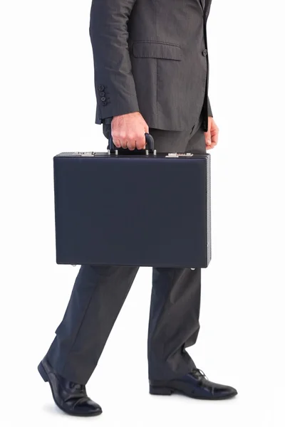 Businessman holding briefcase walking — Stock Photo, Image