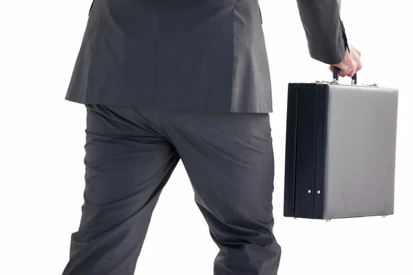 Handsome businessman holding briefcase walking — Stock Photo, Image