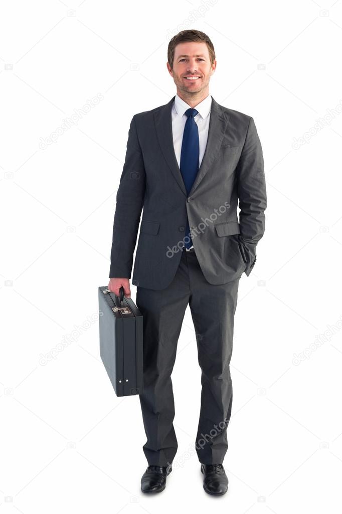 Businessman With Briefcase In His Businessman Standing With His Briefcase Stock Photo