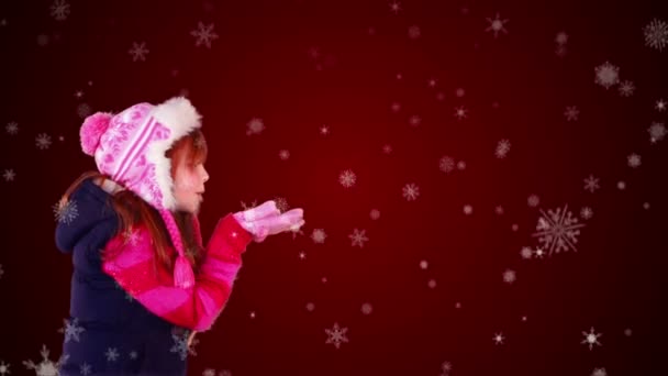 Festive petite fille soufflant Noël magique salutation — Video