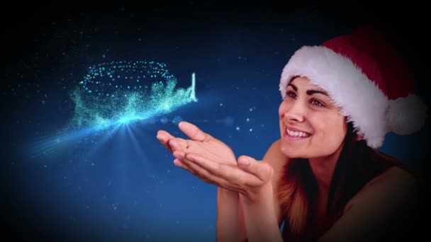 不思議なクリスマスの挨拶を吹いてお祝いブルネット — ストック動画
