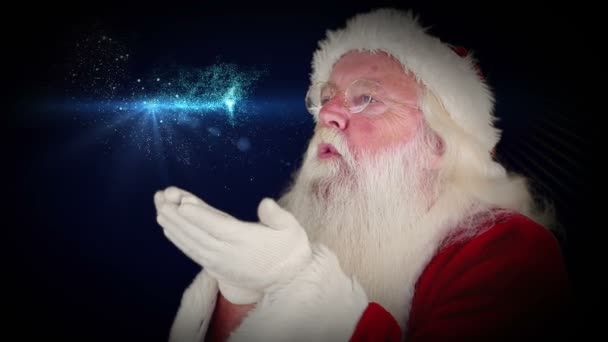 Weihnachtsmann bläst glitzernden Weihnachtsgruß — Stockvideo