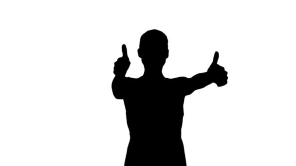 Woman showing thumbs up in black silhouette — Stock Video