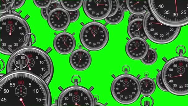 Stopwatches vallen op groene achtergrond — Stockvideo