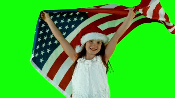 Праздничная маленькая девочка с флагом США — стоковое видео