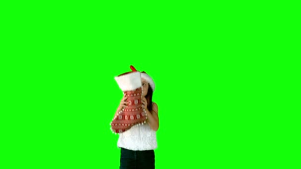 Little girl throwing stocking — Stock Video