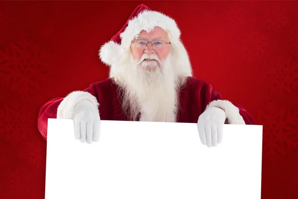 Santa je drží ceduli — Stock fotografie