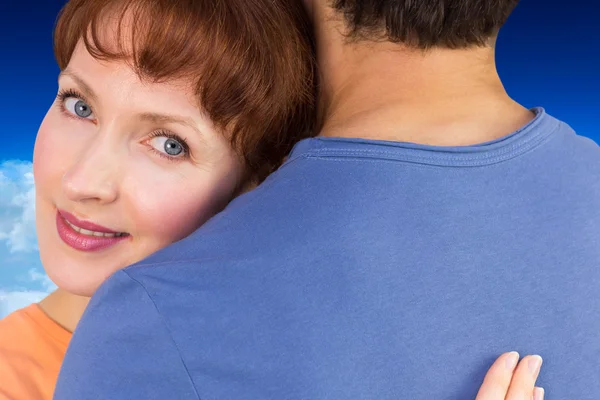 Happy couple hugging one another — Stock Photo, Image