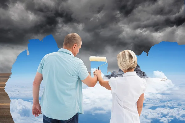 Older couple painting the sk — Stock Photo, Image
