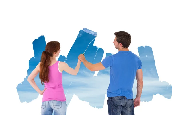 Couple painting together a sky — Stock Photo, Image