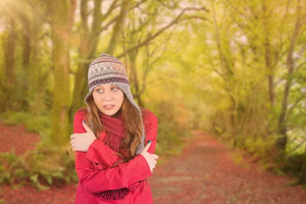Cold redhead wearing coat and hat — Stock Photo, Image