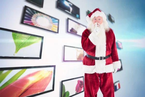 Papai Noel pedindo silêncio para câmera — Fotografia de Stock