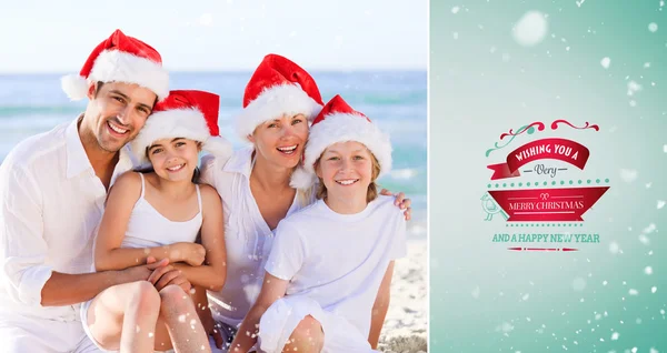 Family during Christmas day at beach — Stock Photo, Image