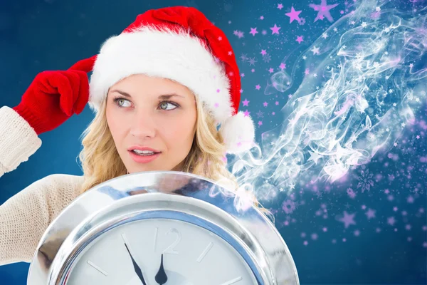 Festive blonde with clock — Stock Photo, Image