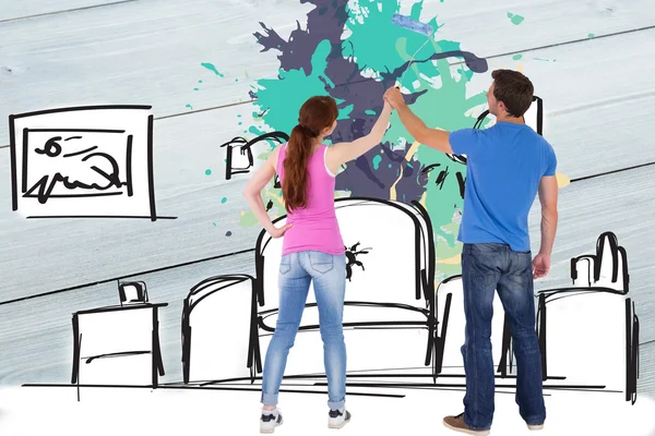 Couple painting wall together — Stock Photo, Image