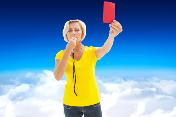 Mature blonde showing red card — Stock Photo, Image