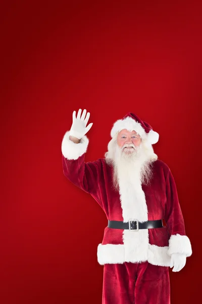 Jolly Santa waving at camera — Stock Photo, Image