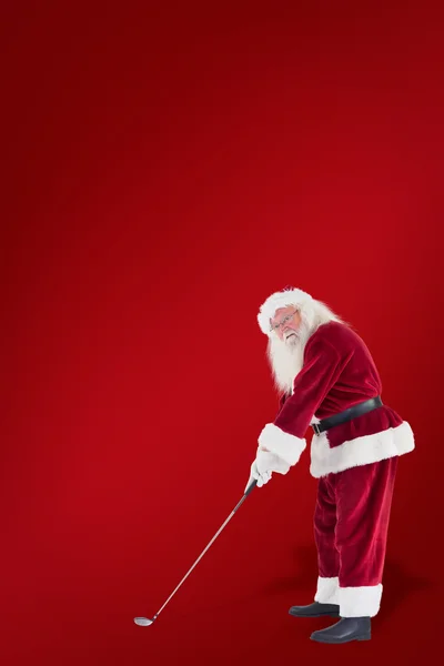 Santa Claus is playing golf — Stock Photo, Image