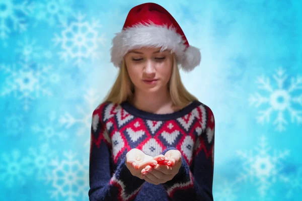 Festive blonde holding hands out — Stock Photo, Image