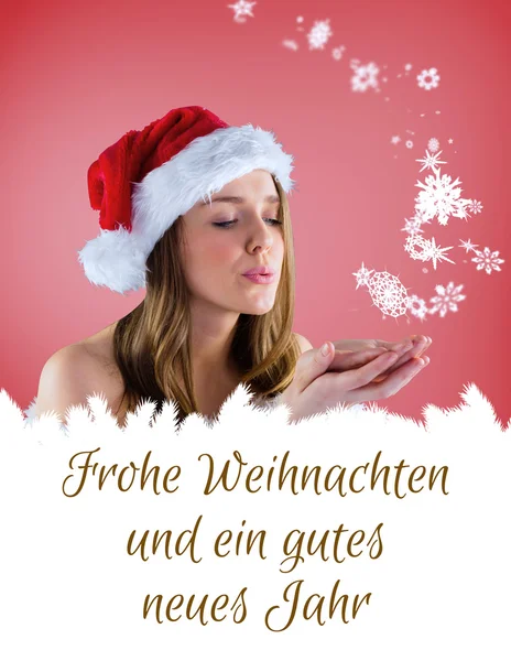 Sexy Weihnachtsmann Mädchen bläst über Hände — Stockfoto