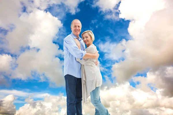 Happy mature couple hugging and smiling — Stock Photo, Image