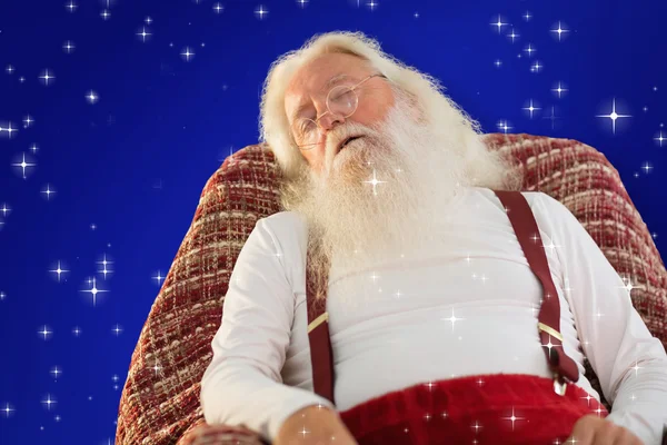 Santa Claus sleeps on armchair — Stock Photo, Image