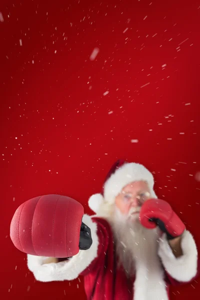 Santa Claus punches with right — Stock Photo, Image