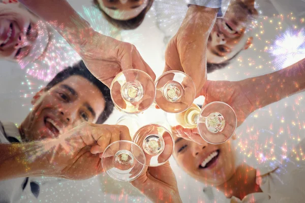 Smiling team of business people honoring — Stock Photo, Image
