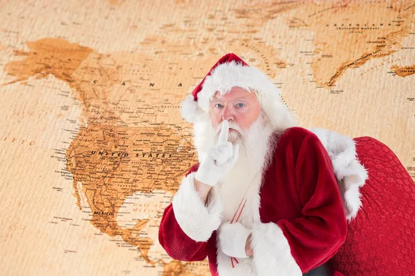 Santa pidiendo silencio con bolsa —  Fotos de Stock