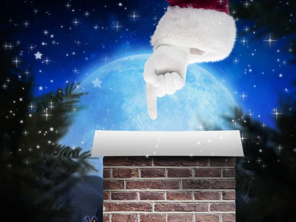 Santa Claus points at something — Stock Photo, Image