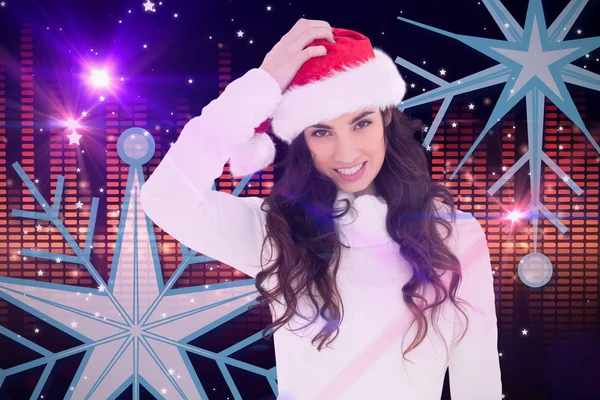 Confused brunette in santa hat — Stock Photo, Image